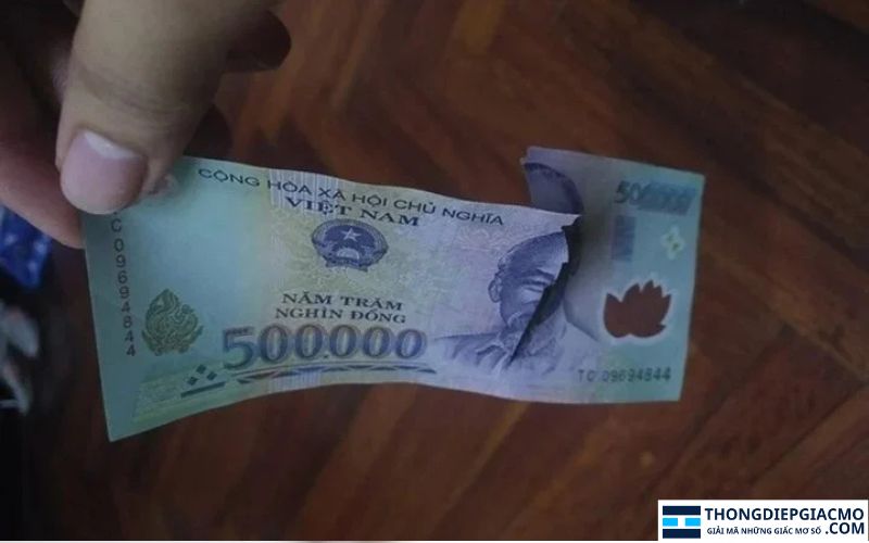 Nằm mơ thấy tiền 500k bị rách